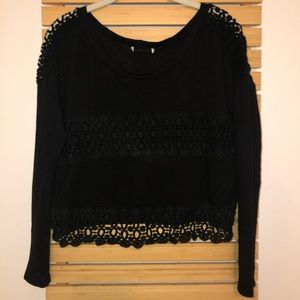 Black cropped sweater.